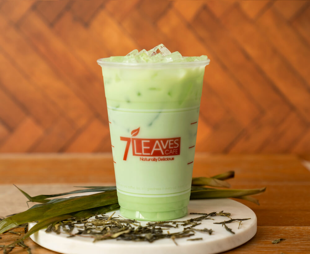 a photo of cold mung bean milk tea drink in a cup