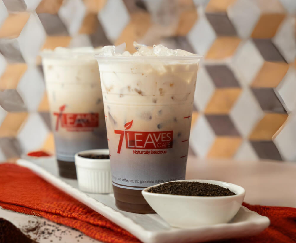 a photo of cold assam milk tea drink in a cup